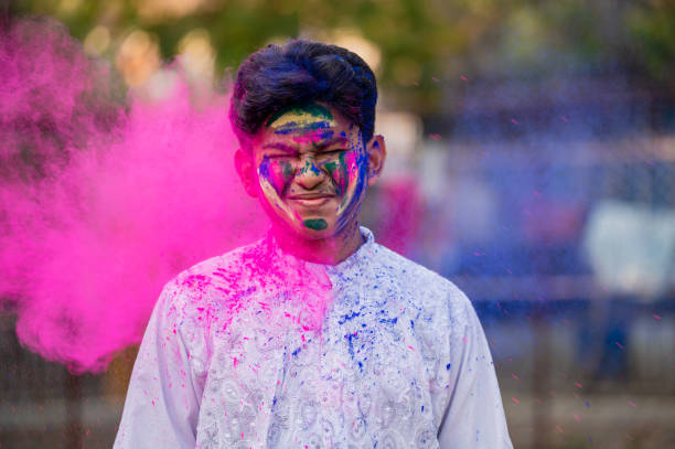 istock Young boy Celebrating Holi Festival 1298252178