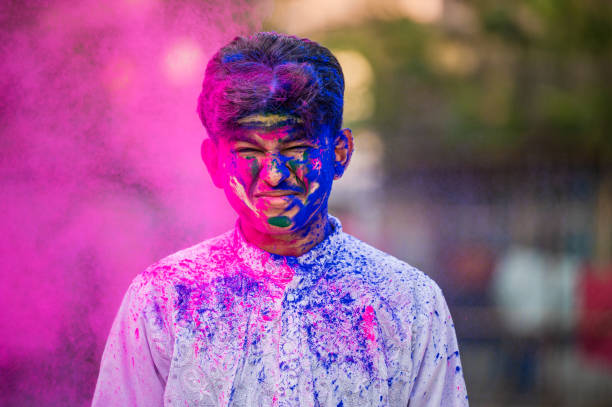 istock Young boy Celebrating Holi Festival 1298252257