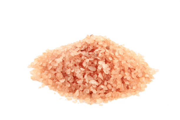 istock Himalayan yellow salt isolated on white background 1298252319