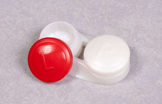 istock Red contact lens case, isolated on grey background 1298253733