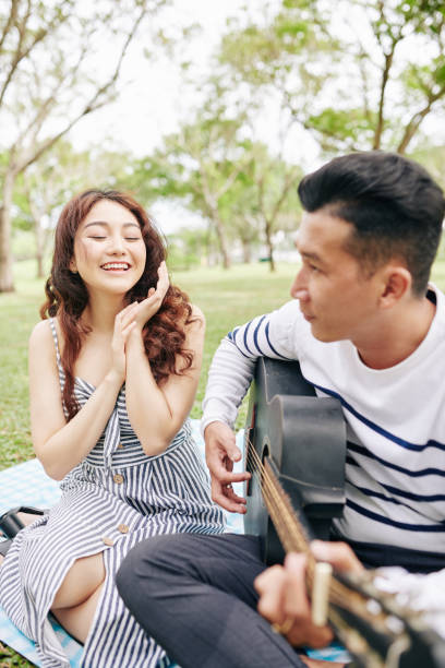 istock Woman applauding singing boyfriend 1298254259