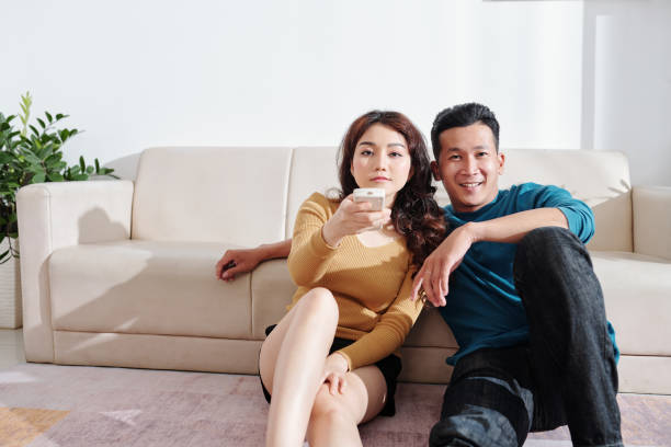 istock Couple watching tv 1298254354