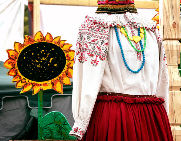 istock The ancient national dress and a hat on the dummy. 1298254639