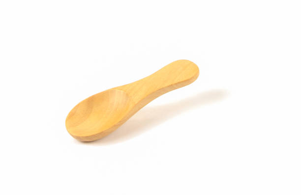istock spoon wood isolated on white background and shadow with clipping path 1298255302