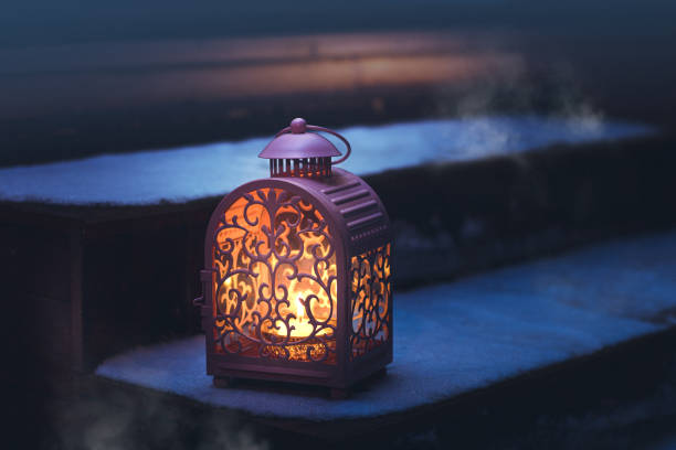 istock Candle lamp in the dark - lantern 1298257057