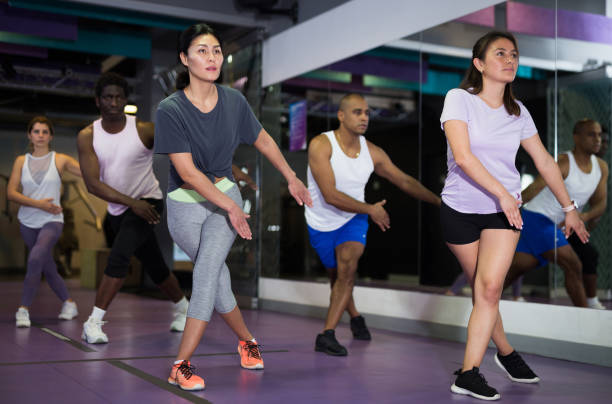 istock Young adult people training in dance studio 1298257263