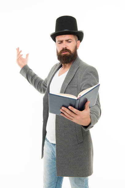 istock Imagination is more important than knowledge. Poet read poetry book isolated on white. Using imagination. Imagination and fantasy. School and education. Just imagine. Literature awakens imagination 1298259848