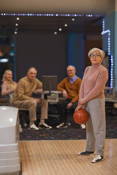 istock Senior People at Bowling Alley 1298262512