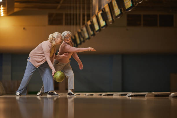 300+ Senior Bowling Team Stock Photos, Pictures & Royalty-Free Images