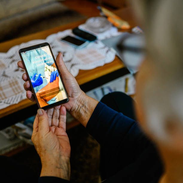 istock Senior woman looking application on smartphone 1298262906