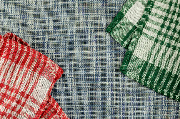 istock Red and green checkered blue denim cloth napkin. 1298264371