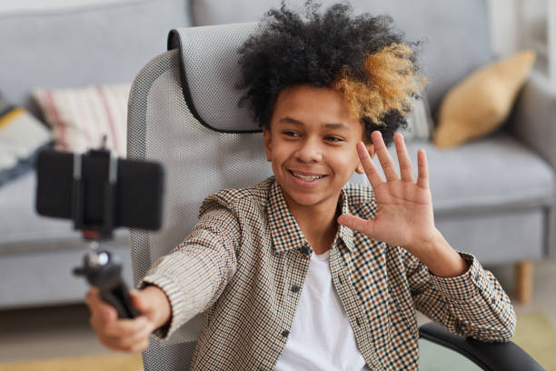 African-American Boy Recording Videos