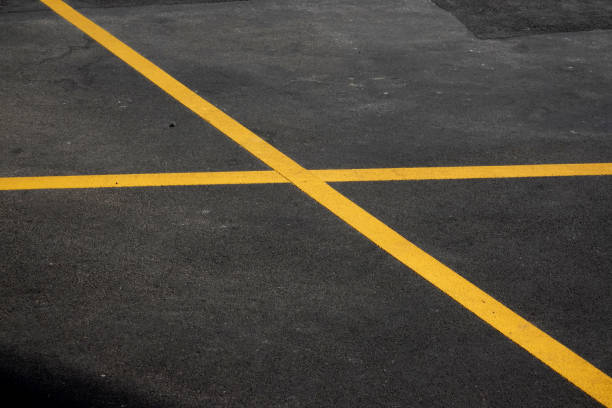X shape ,geometric shapes on the asphalt texture background.