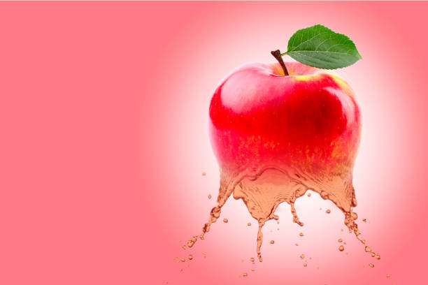 Delicious slices of juicy yellow, green and red apple that explode and turn into refreshing apple juice.  Isolated on white background.