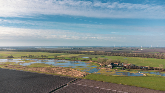 Aerial view on the former island of Schokland in The Noordoostpolder, Flevoland, The Netherlands. The trees show the outline of the former island, that lies elevated above the rest of the land.
