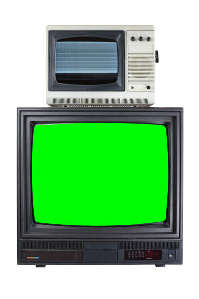 istock Two old vintage TVs with a green screen for adding video, isolated on a white background. 1298270797