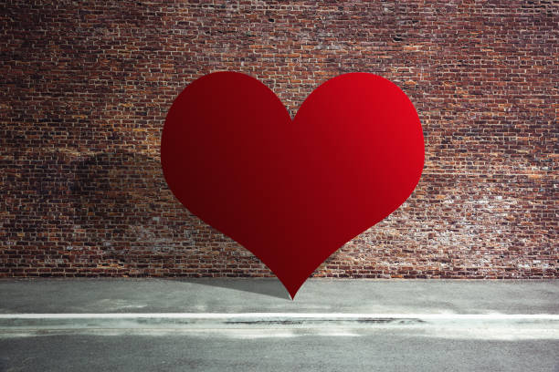 istock love heart shape on the brick wall 1298271706