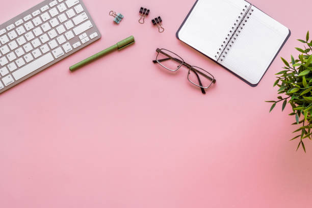 istock Office workplace flat lay background. Keyboard and office supplies top view 1298276025