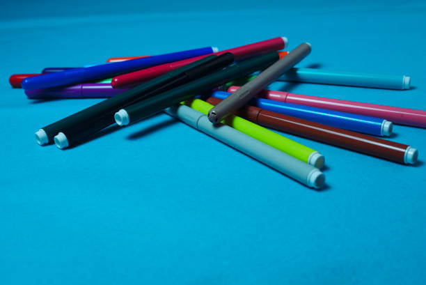 istock colors, colored markers on a light blue background 1298276154