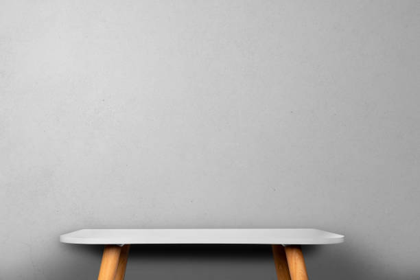 istock Mockup desk in workplace showcase modern interior minimalist with blank, workspace and presentation, furniture and exhibition empty, office room with hipster and cement wall background, copy space. 1298277883