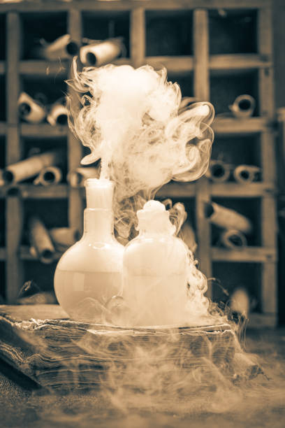 istock Unique alchemist laboratory full of medieval scrolls and chemical flask 1298279822