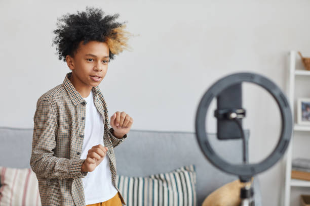 African-American Boy Recording Videoblog