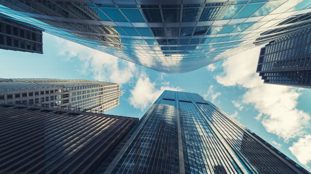 Low angle of tall corporate buildings skyscraper in Chicago, United States, 4k time lapse clip