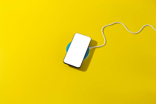 istock Smartphone with a clean screen lies on wireless charging 1298284458