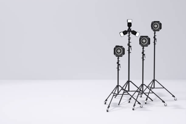istock Photography studio flash on a lighting stand on white background 1298284785
