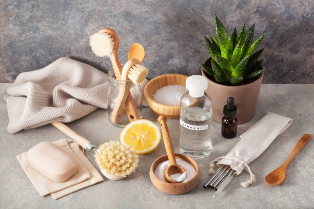 istock zero waste eco friendly cleaning kitchen concept. wooden brushes, lemon, baking soda, vinegar, drinking straw 1298286765
