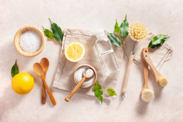 istock zero waste eco friendly cleaning concept. wooden brushes, lemon, baking soda, vinegar 1298287152