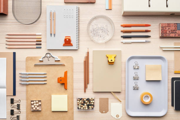 Various stationery arranged in order Flat lay of assorted modern supplies for education placed in order on table in workplace office equipment stock pictures, royalty-free photos & images