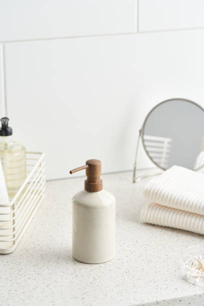 istock Bottle of natural soap in bathroom 1298290651