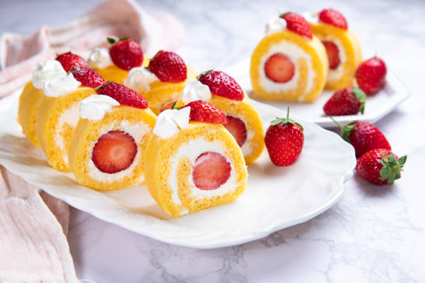 istock Strawberry shortcake cake roll with cream cheese whipped cream 1298294634