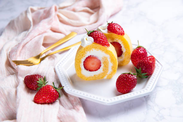 istock Strawberry shortcake cake roll with cream cheese whipped cream 1298294716