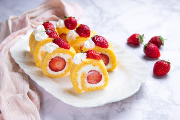 istock Strawberry shortcake cake roll with cream cheese whipped cream 1298294739