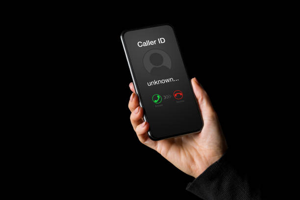 istock Person receiving call on phone from an unknown caller 1298294845