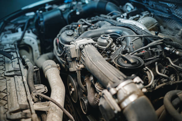 istock Dirty engine under the hood of a car 1298298761