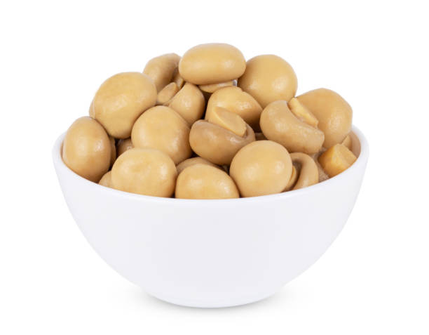 group of Mushrooms in a white bowl, isolated on white background