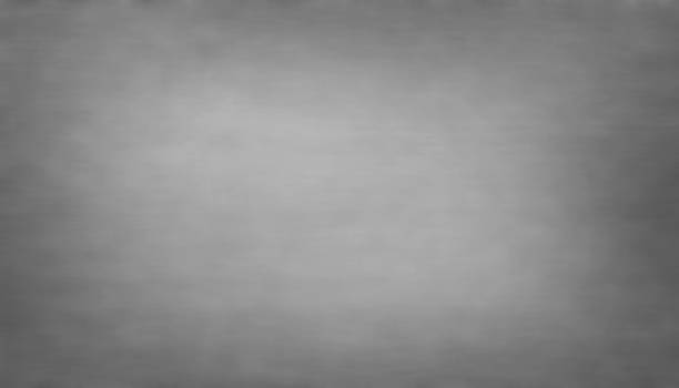 istock Grey color background texture with dark vignette. 1298317281