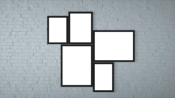 istock Different size framed photos hanging on the grey wall. 3d rendering 1298318673