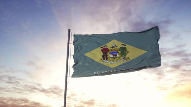 istock State flag of Delaware waving in the wind. Dramatic sky background. 3d illustration 1298318964