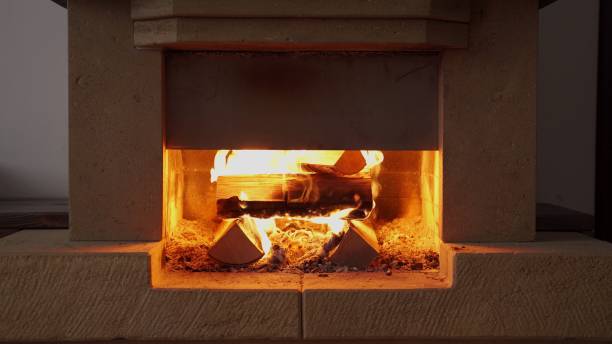 istock Firewood is burning in the home fireplace 1298322044