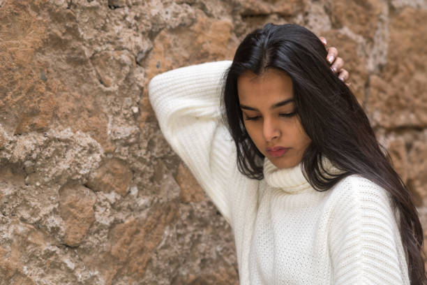 istock Contemplative young woman 1298322517