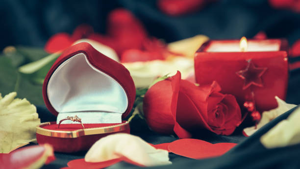 istock romantic composition for Valentine's day on black silk 1298326250
