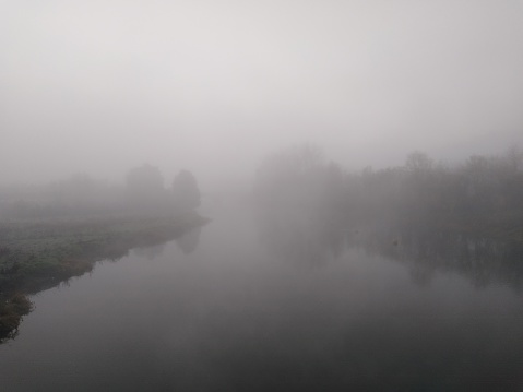 Foggy river from a bridge