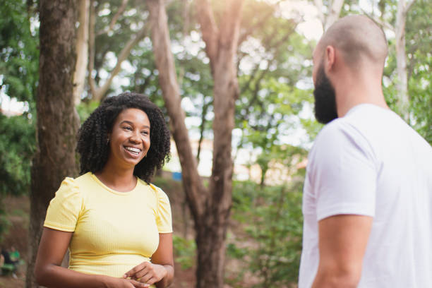 istock Two friends on the park 1298331747