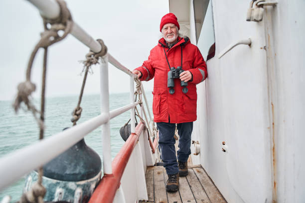 istock Fisherman walking through the boat while preparing to fishing 1298334144