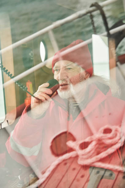 istock Man saying something at the radio set while navigating 1298334210