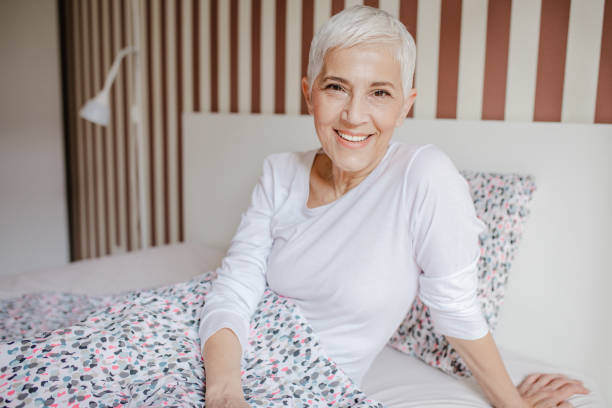 6,500+ Older Woman In Pajamas Stock Photos, Pictures & Royalty-Free ...